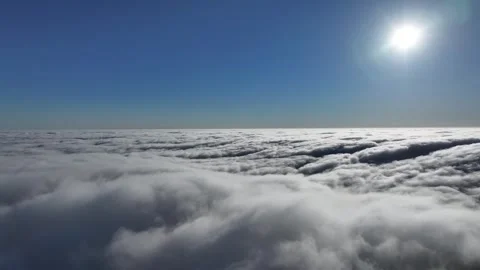 Above the dark gloom is a subtle movement of cloud and sun Stock Footage 336939536