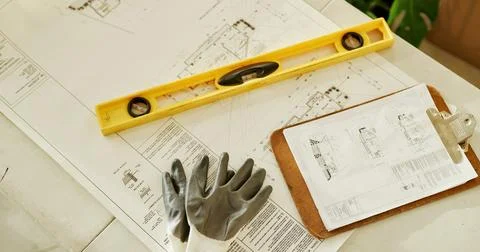 Above, document and table with blueprint for architecture, planning and ske.. Stock Photos