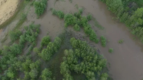 Above flooded coasts of river after heaver rain 4K drone footage Stock Footage 110588430