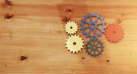 Above, gears and space on table for problem solving, planning and workflow in Stock Photos