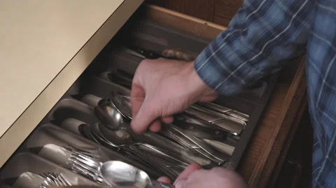 Above Grab Silverware Utensils and Put Away Stock Footage 61710231