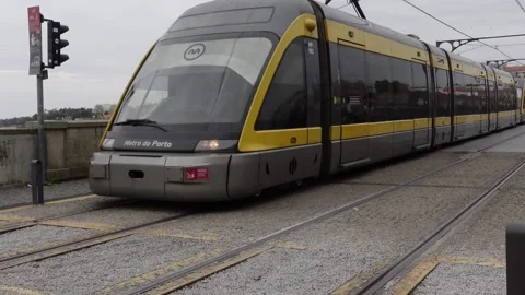 An above-ground metro train at Jardim do Morro subway station Stock Footage 293386892