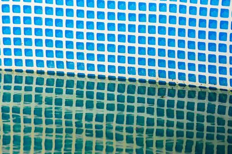 Above ground pool with a problem of green algae in the water Stock Photos