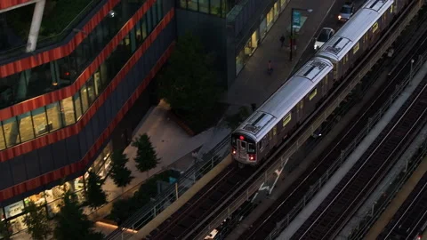 Above ground subway passing through Queens Stock Footage 254116415