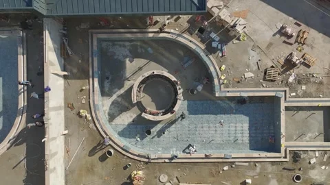 From Above: House Building and Pool Tiling in Progress Stock Footage 295727009