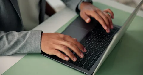 Above, journalist or hands in office with laptop, industry research or edit of Stock Footage 324385657