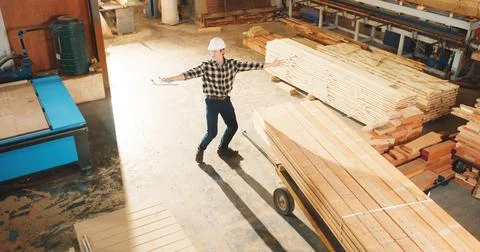 Above, man and dancing in workshop for carpentry, good news and celebration for Stock Photos