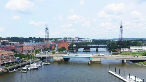 From above panoramic view of road bridge with cars over river in Norwalk Stock Footage 114624752