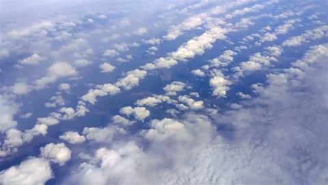 Above Puffy Clouds Stock-Footage 73870859