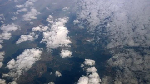 Above Puffy Clouds Stock-Footage 74473090