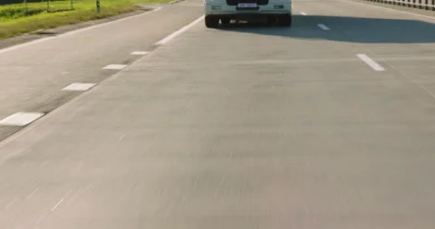 Above the road surface background. Cargo truck driving on a road. Stock Footage 170939290