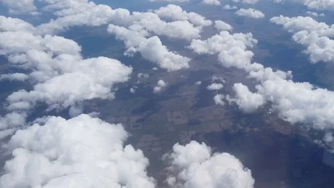 Above the sky. Flying over clouds in plane Stock Footage 111034831