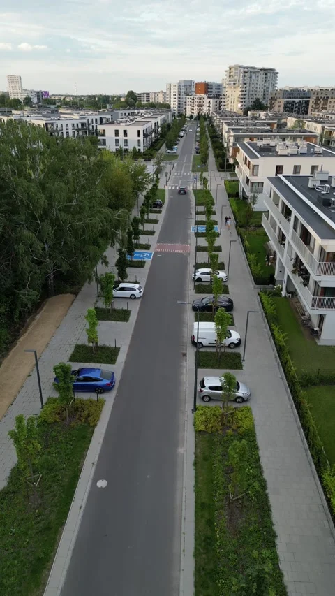 Above the Streets: Vertical 4K Drone Glide Through Residential Quarters Видео 258964852