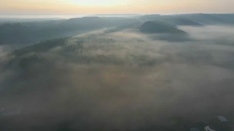 Above summer forest and clouds on sunrise. Fog and forest. Stock Footage 141582237