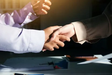 Above table with finance papers, graphs and big data during teamwork meetin.. Stock Photos
