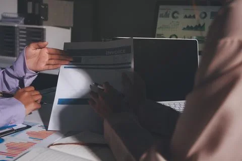 Above table with finance papers, graphs and big data during teamwork meetin.. Stock Photos