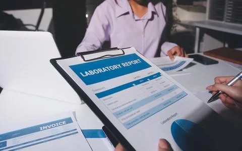 Above table with finance papers, graphs and big data during teamwork meetin.. Stock Photos