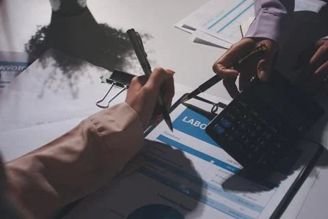 Above table with finance papers, graphs and big data during teamwork meetin.. Stock Photos