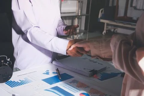 Above table with finance papers, graphs and big data during teamwork meetin.. Stock Photos