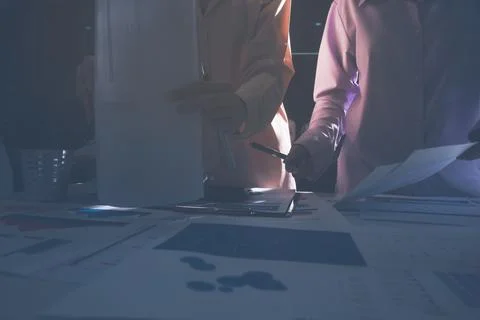 Above table with finance papers, graphs and big data during teamwork meetin.. Stock Photos