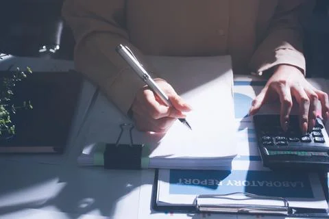 Above table with finance papers, graphs and big data during teamwork meetin.. Stock Photos