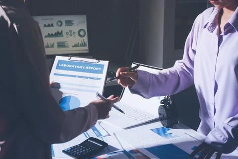 Above table with finance papers, graphs and big data during teamwork meetin.. Stock Photos