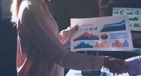 Above table with finance papers, graphs and big data during teamwork meetin.. Stock Photos