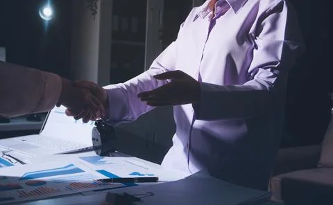 Above table with finance papers, graphs and big data during teamwork meetin.. Stock Photos