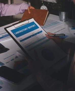 Above table with finance papers, graphs and big data during teamwork meetin.. Stock Photos