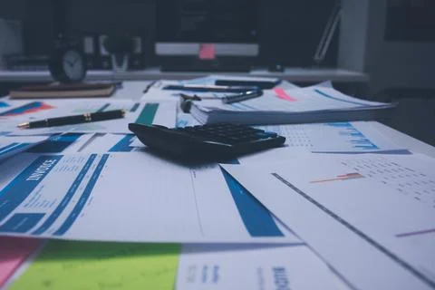 Above table with finance papers, graphs and big data during teamwork meetin.. Stock Photos