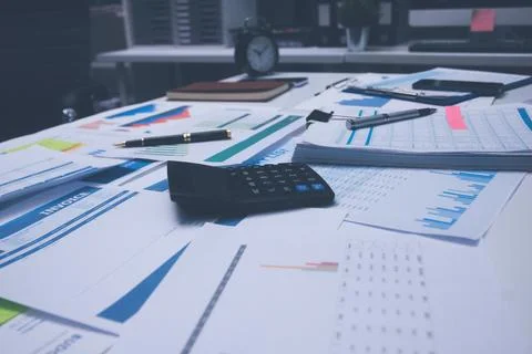 Above table with finance papers, graphs and big data during teamwork meetin.. Stock Photos