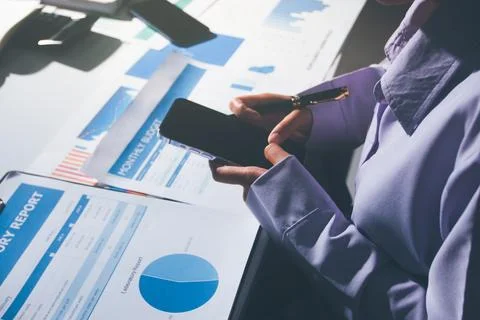 Above table with finance papers, graphs and big data during teamwork meetin.. Stock Photos
