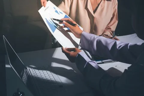 Above table with finance papers, graphs and big data during teamwork meetin.. Stock Photos