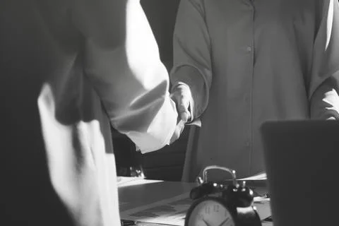 Above table with finance papers, graphs and big data during teamwork meetin.. Stock Photos