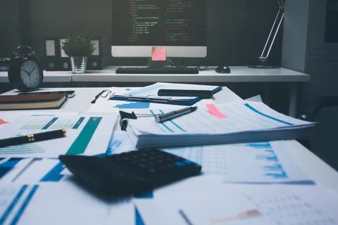 Above table with finance papers, graphs and big data during teamwork meetin.. Stock Photos