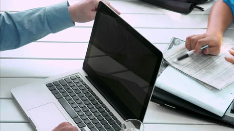 Above view angle of a young casual and focused business team working with modern Stock Footage 199633654