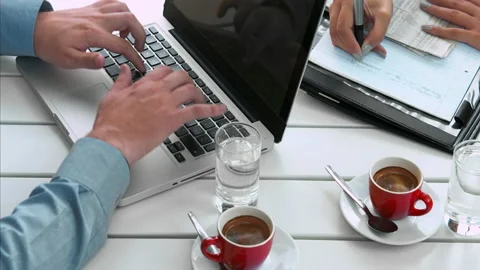 Above view angle of a young casual and focused business team working with modern Stock Footage 199634273