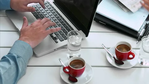 Above view angle of a young casual and focused business team working with modern Stock-Footage 199634357