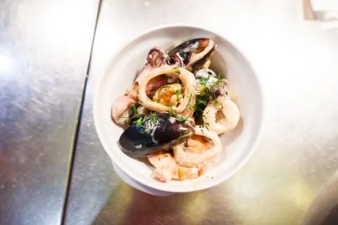 The above view of the dish consisted of the fish, onion circles decorated with Stock Photos