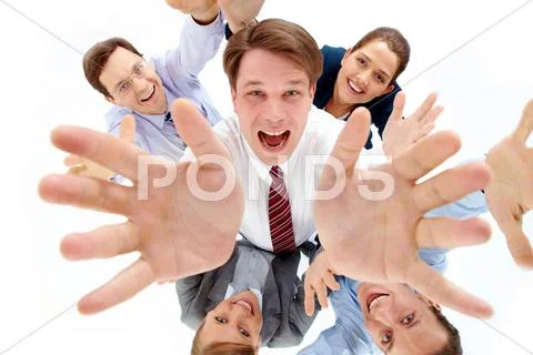 Above view of happy chief surrounded by several partners looking upwards Stock Photos