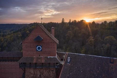 Above view of medieval castle. forest and sunset Foto stock