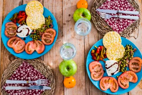 Above view of table with two dishes full of vegetables and diet healthy food  Fotos Stock