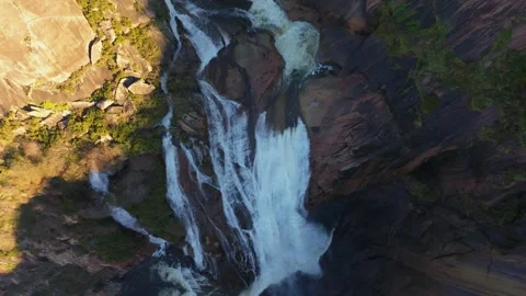 Above View Of A Waterfall With Steep Rock Mountains Stock Footage 262333211
