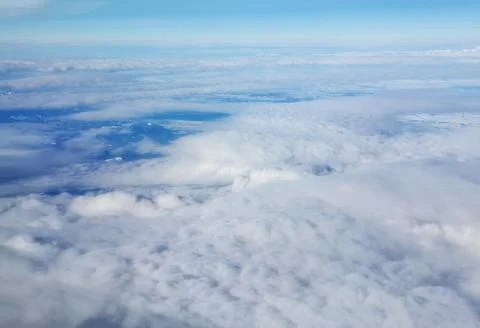 Above winter clouds Stock Photos