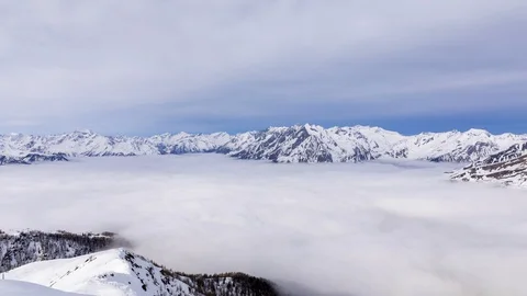 Above the winter clouds time lapse Stock Footage 126933102