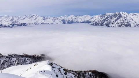 Above the winter clouds time lapse Stock Footage 126933821