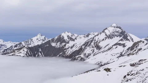 Above the winter clouds time lapse Stock Footage 126935222