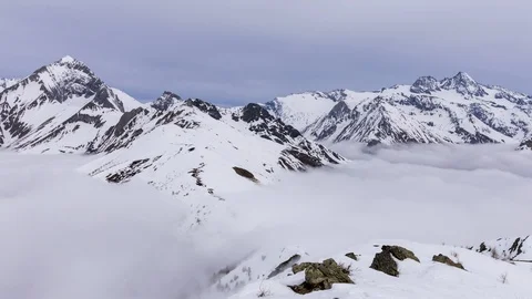 Above the winter clouds time lapse Stock Footage 126936467
