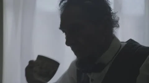 Abraham Lincoln Drinking Coffee Stock Footage 54282707