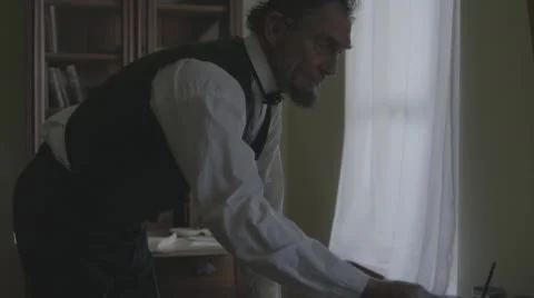Abraham Lincoln Works at a Table Stock Footage 54282822